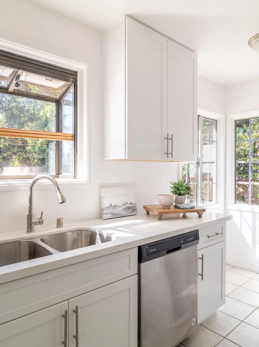 Fit a Tilt-and-Turn for Easy Cleaning — kitchen sink under a window