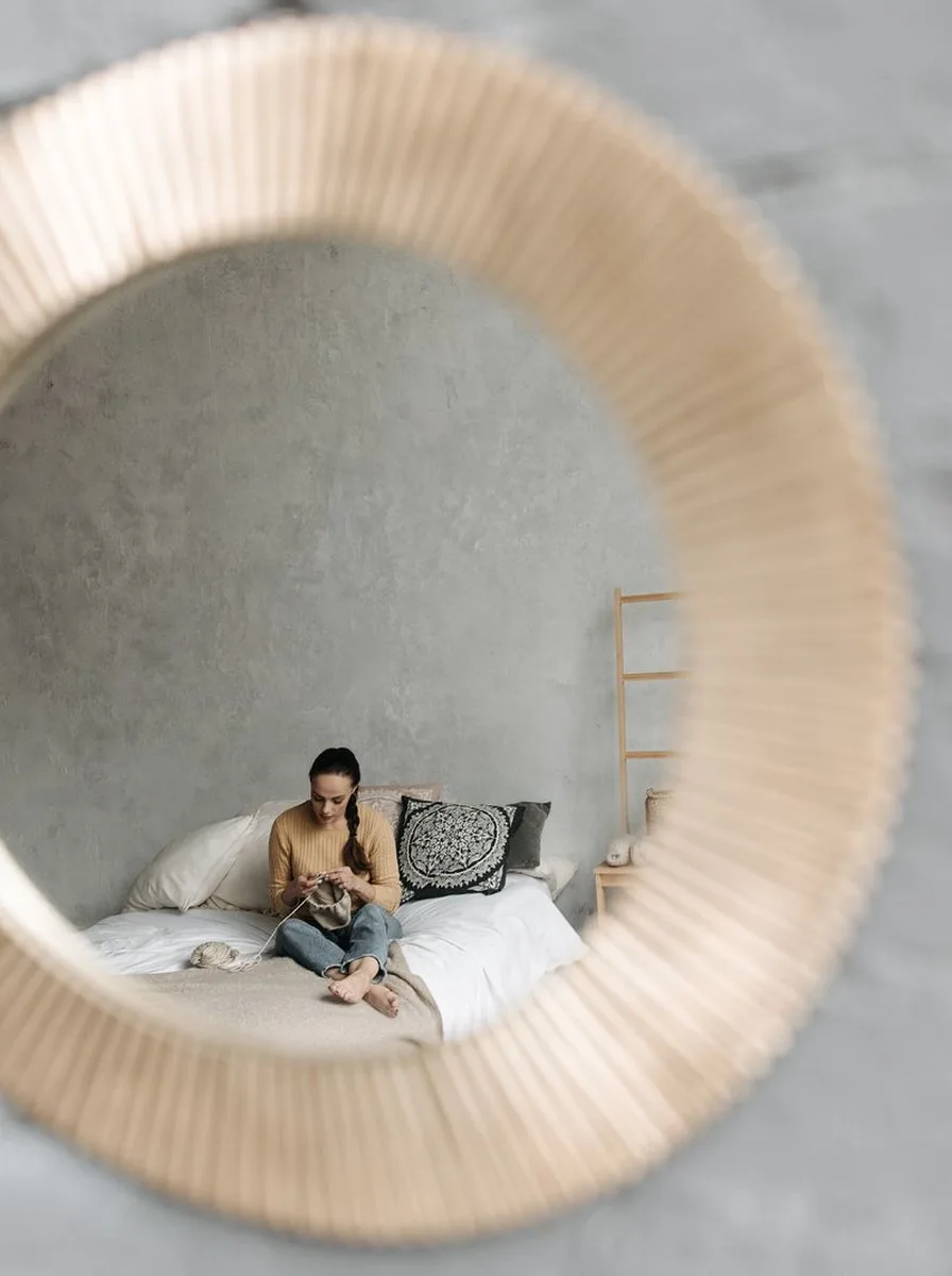 Fresh gallery wall of framed prints in a bedroom