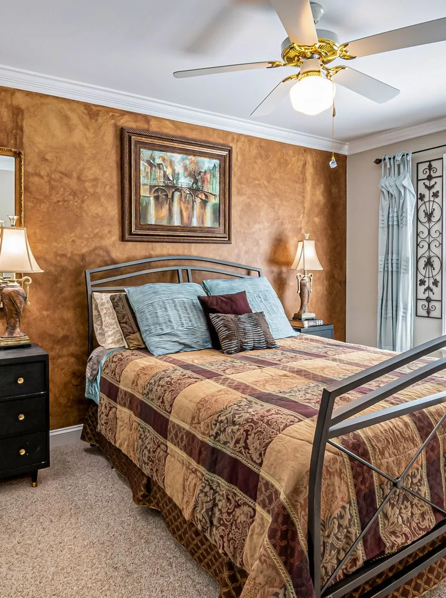 Bedroom glowing with warm dimmable lighting