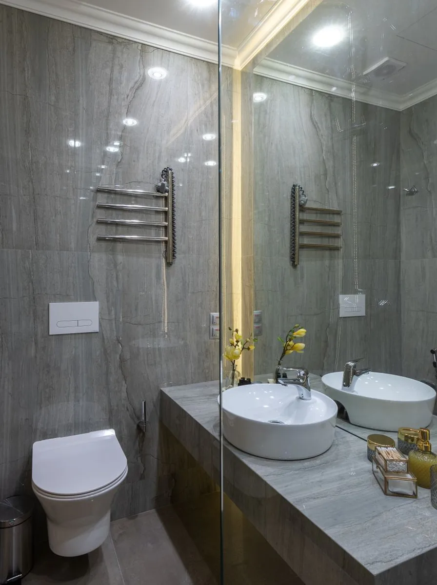 Brass cabinet pulls on bathroom vanity drawers