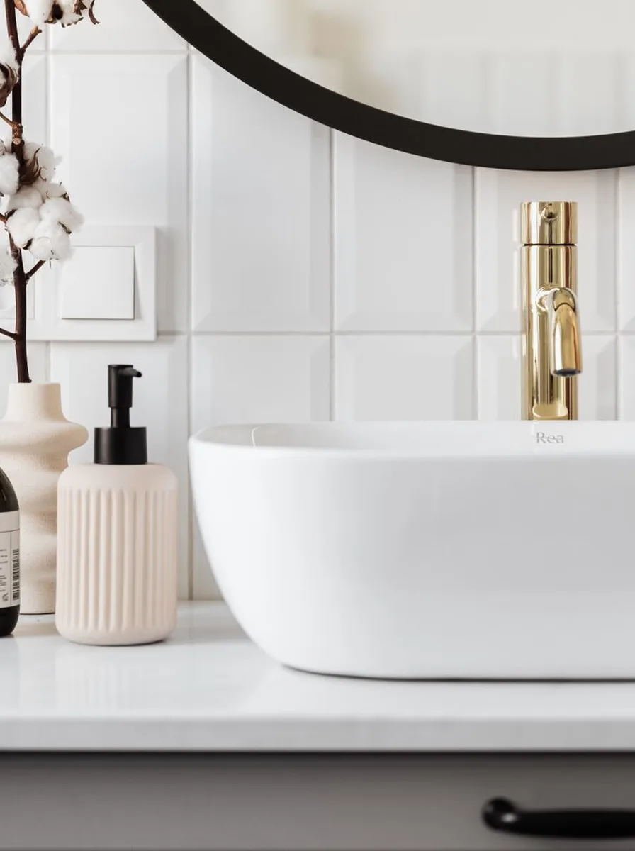 Floating shelves above toilet with baskets and plants