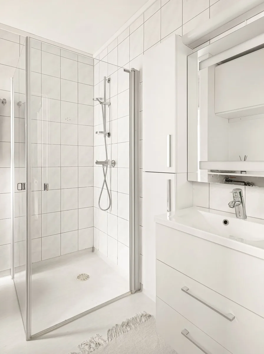 Small floating shelves flanking bathroom mirror