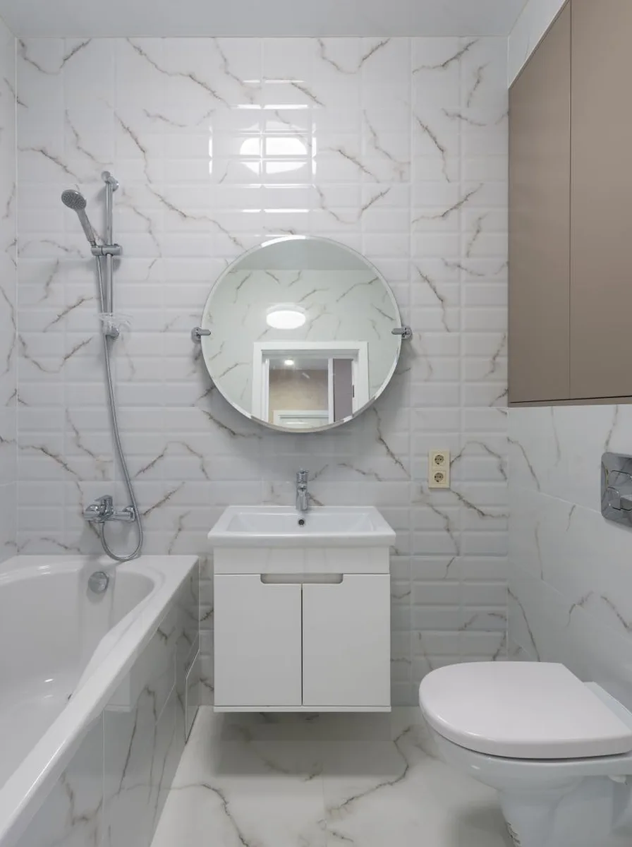 Open shelf under floating vanity with baskets