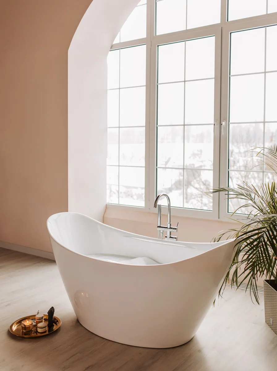 Mirrored cabinet with open shelf below in bathroom