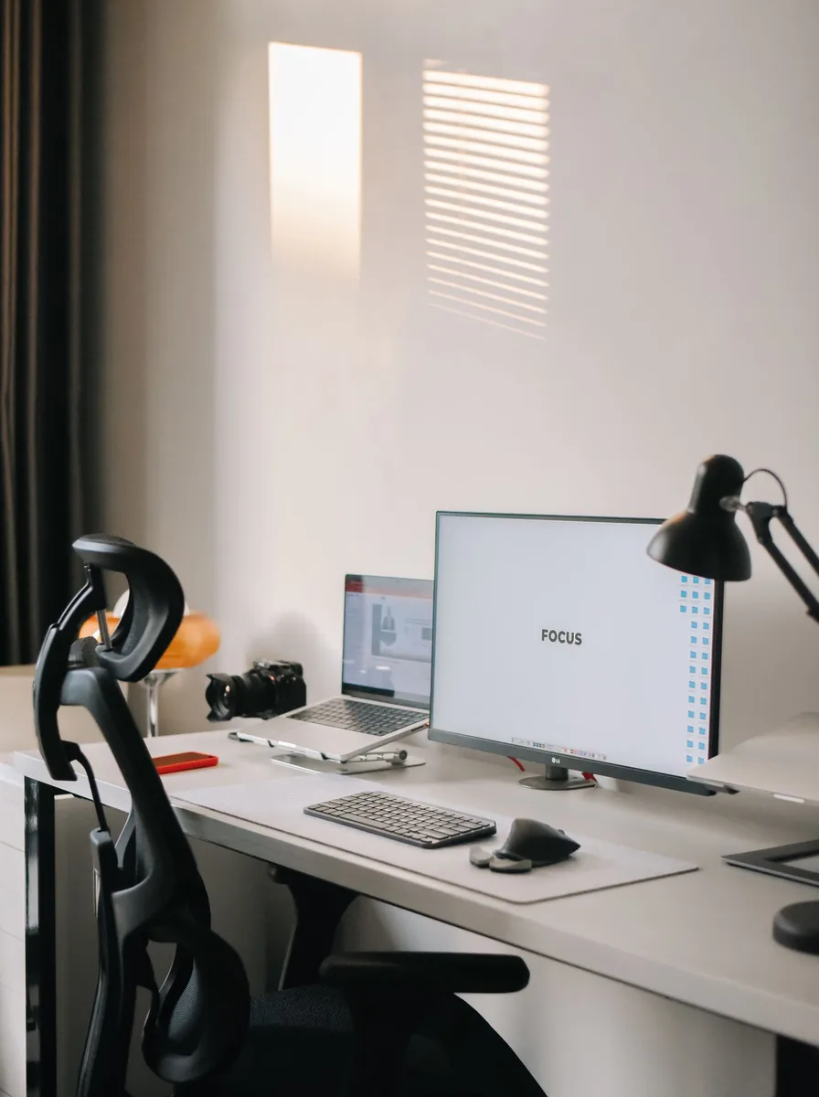 Sleek black desk chair in a modern office