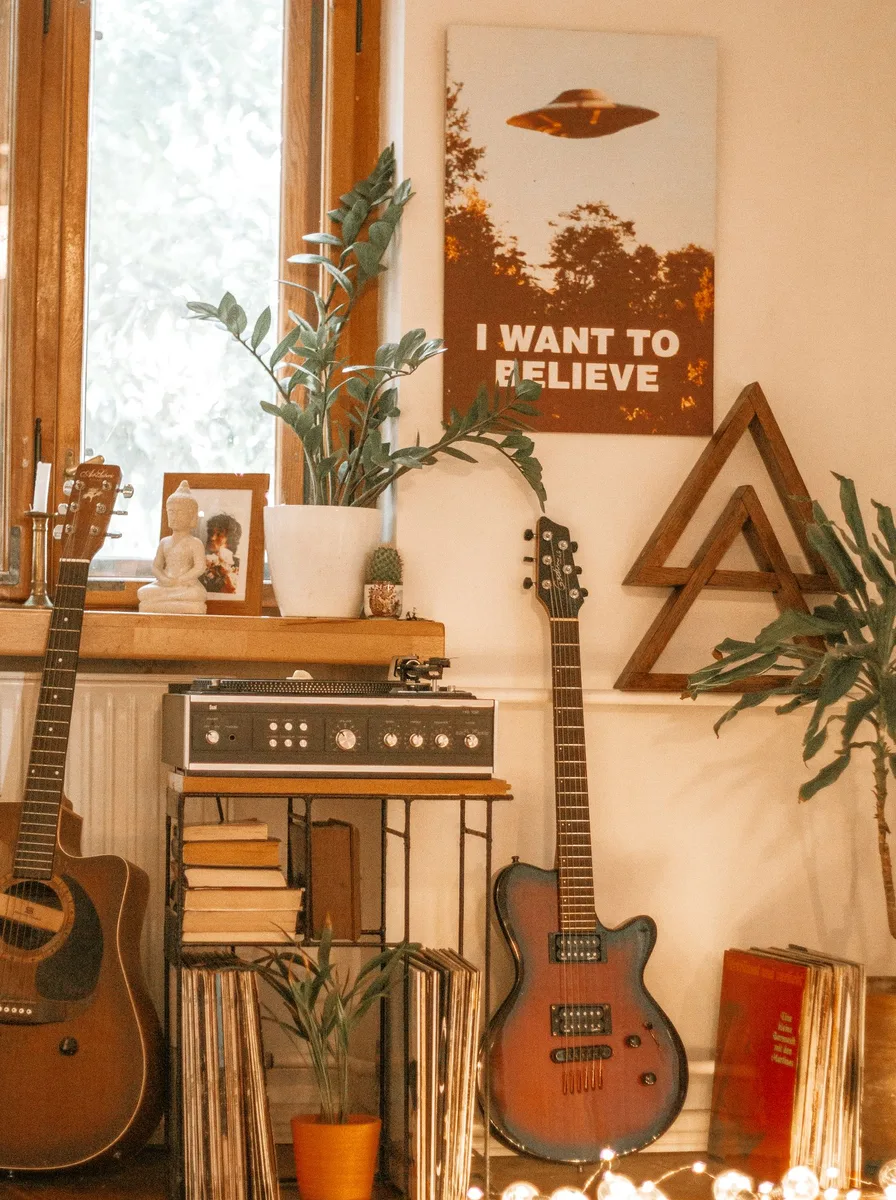 Cozy music corner with guitars and vintage-style wall posters