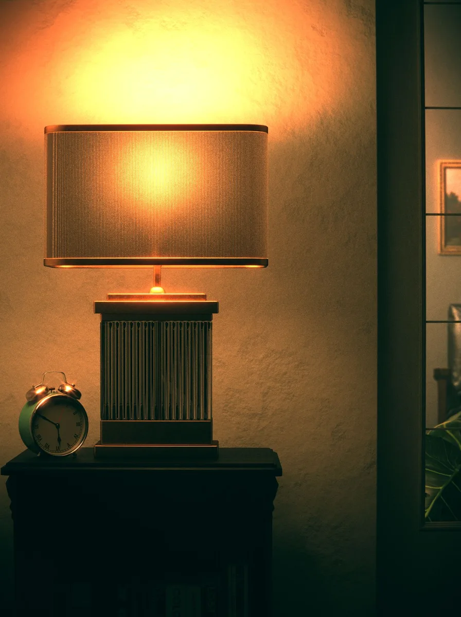 Table lamp on nightstand in dark room
