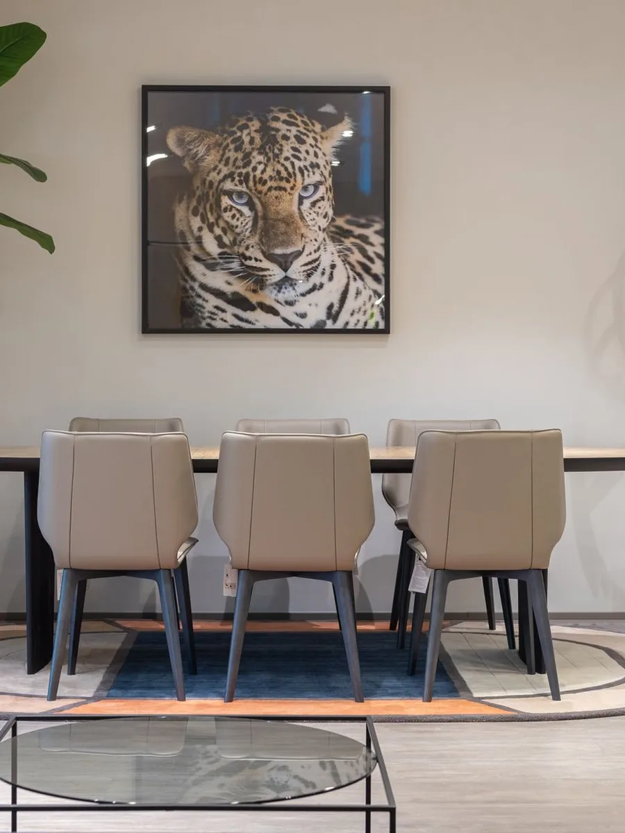 Hanging frames for a dining room gallery wall with careful spacing