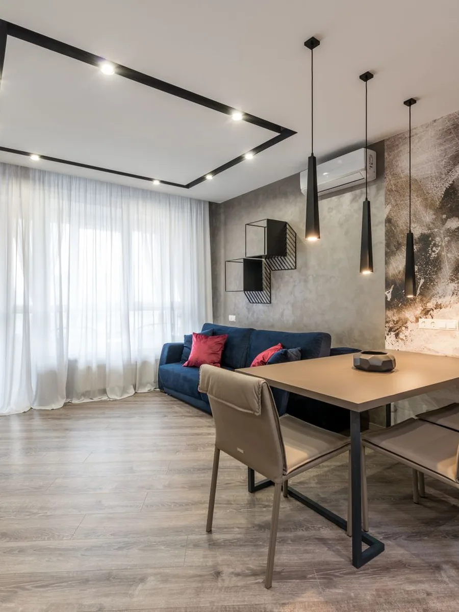 Finished dining room gallery wall styled with furniture and lighting