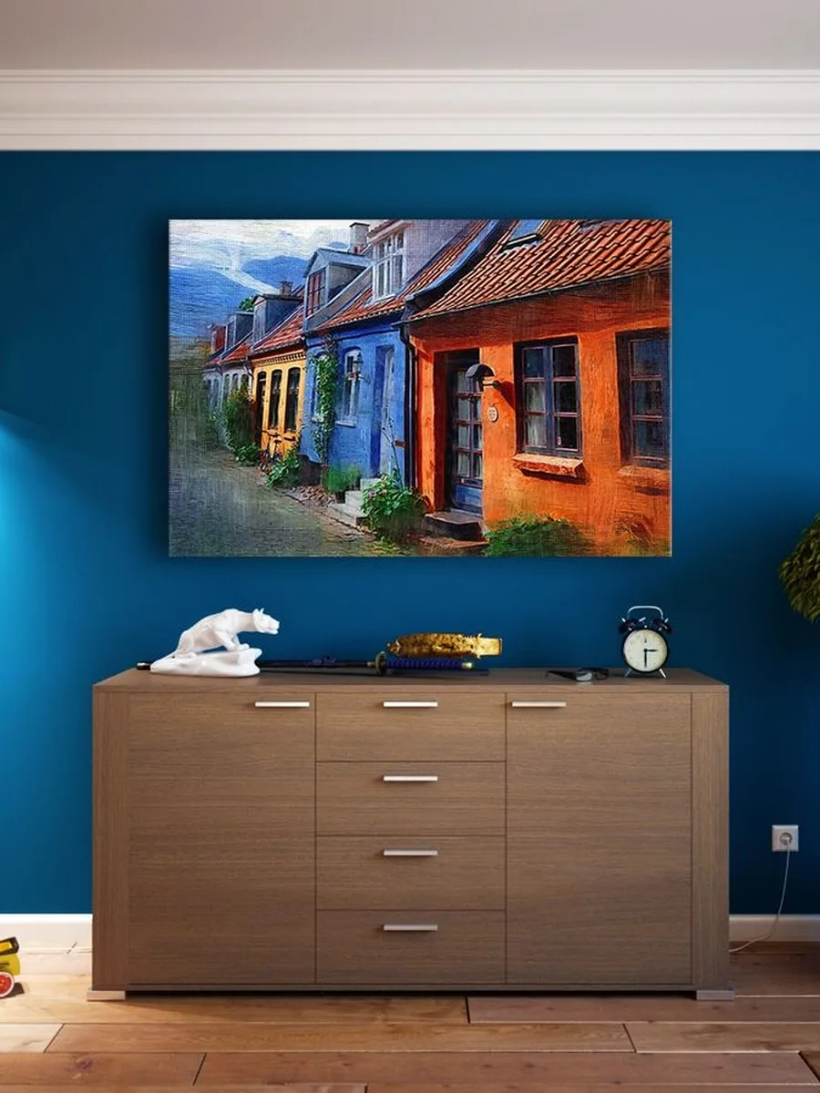 Finished dining room with beautifully curated and hung wall art