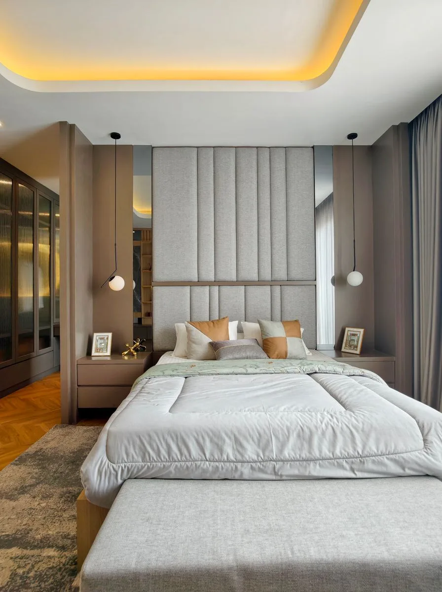Cream bouclé armchair in a neutral bedroom