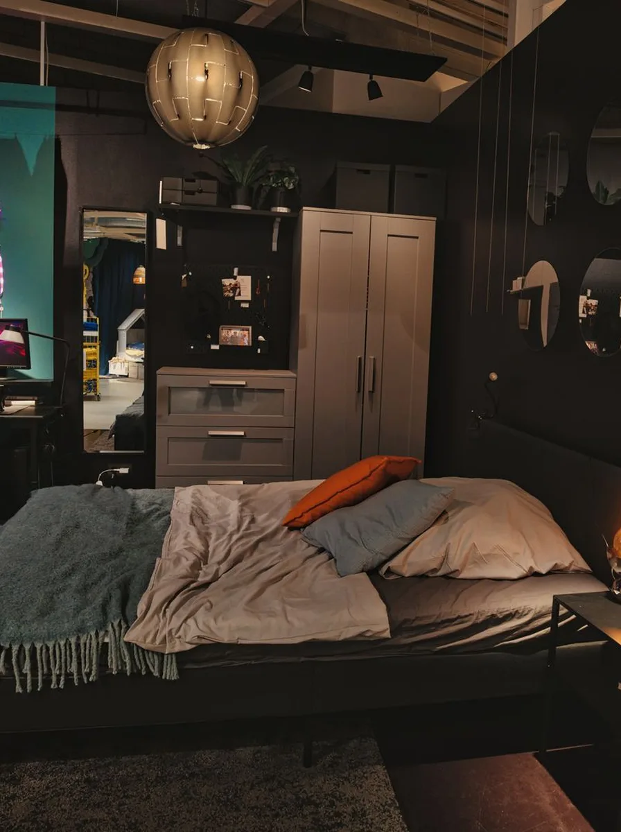 Soft abstract art in neutral tones above a bed