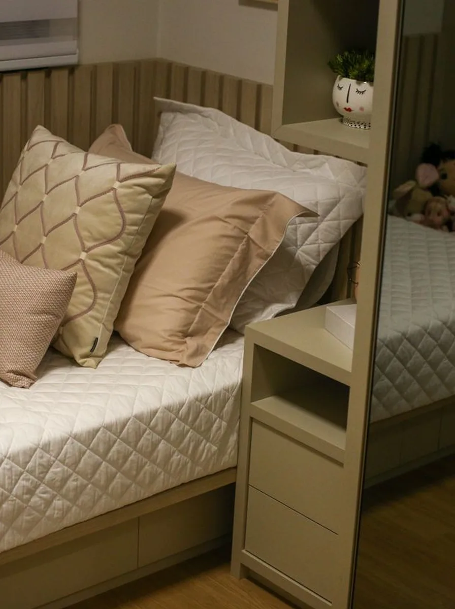 Layered rugs in a cozy teen bedroom