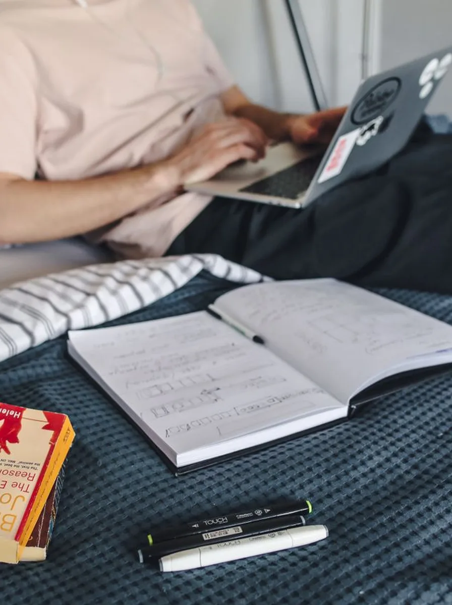 Coffee table books styled in a modern teen bedroom