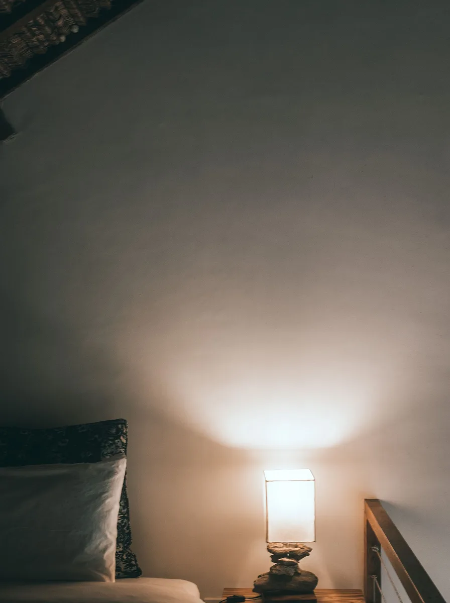 White bedroom with low clean-lined furniture