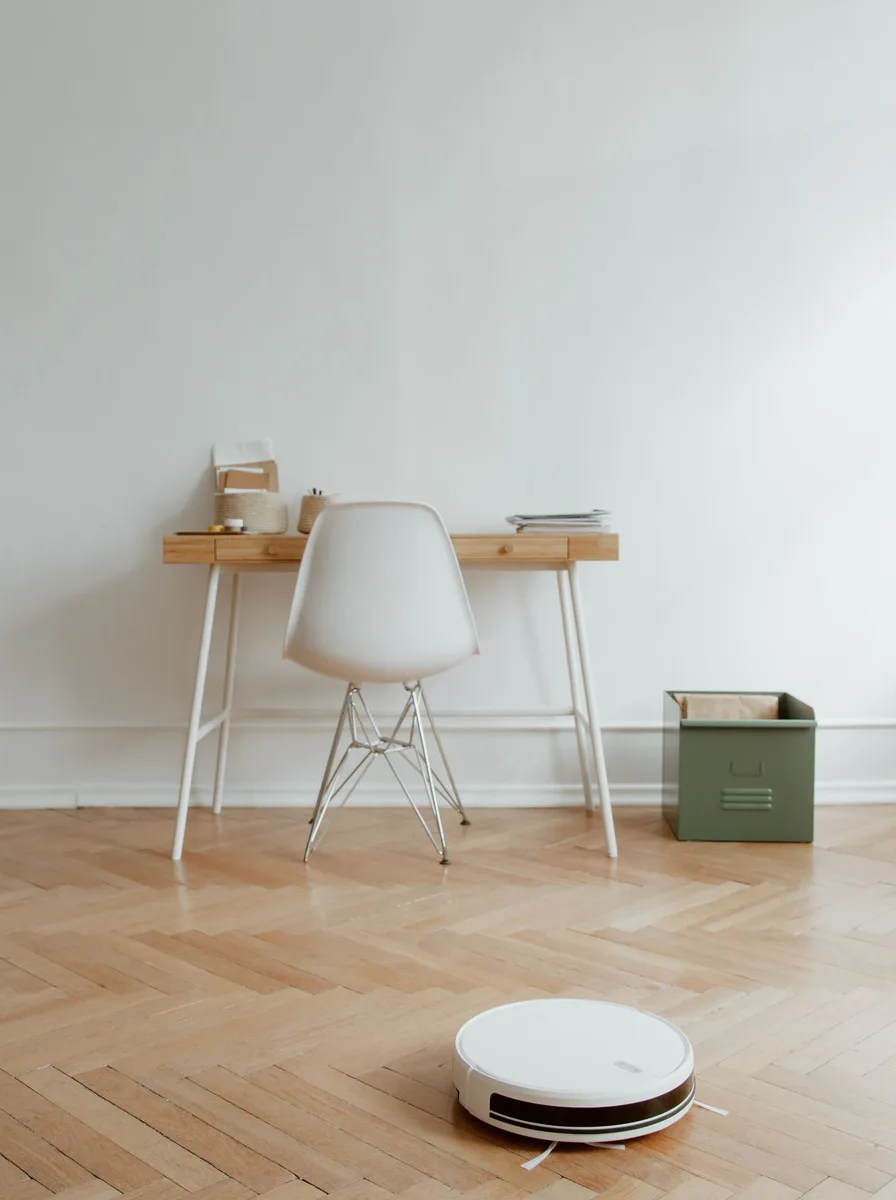 Compact home office chair tucked under a wooden desk