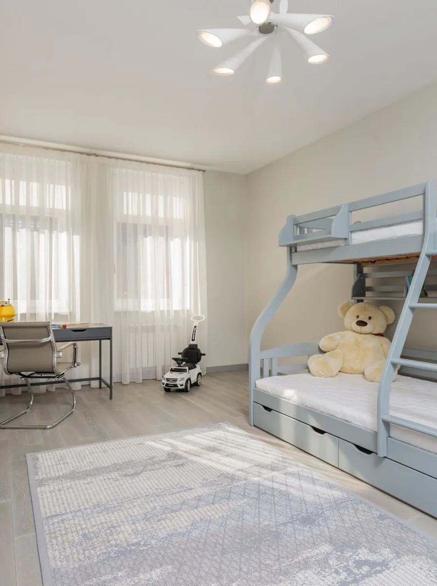 Safe stylish toddler furniture with rounded edges and soft rug