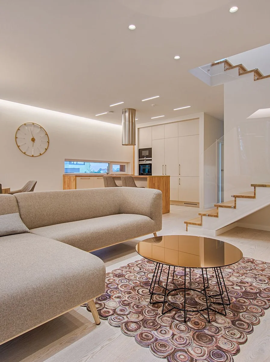 Luxury minimalist living room with high-quality linen sofa and solid oak furniture