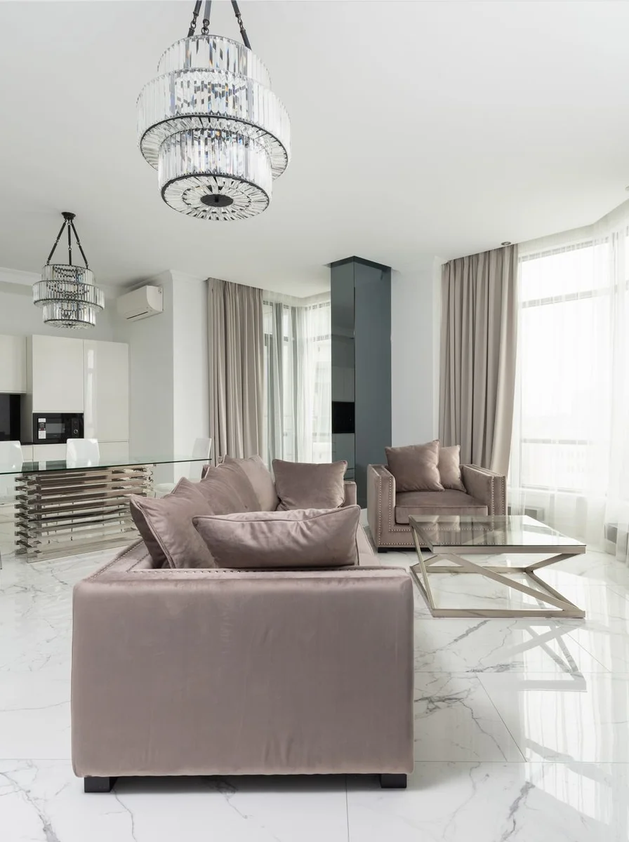 Airy minimalist living room with generous negative space around simple furniture