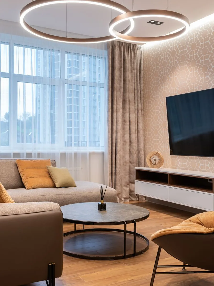 Contemporary black and white living room with geometric black accents