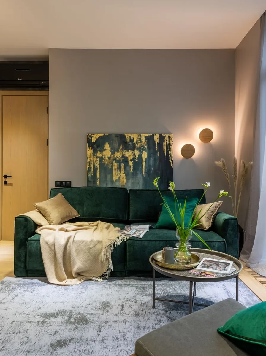 Contemporary living room with velvet ottoman used as coffee table