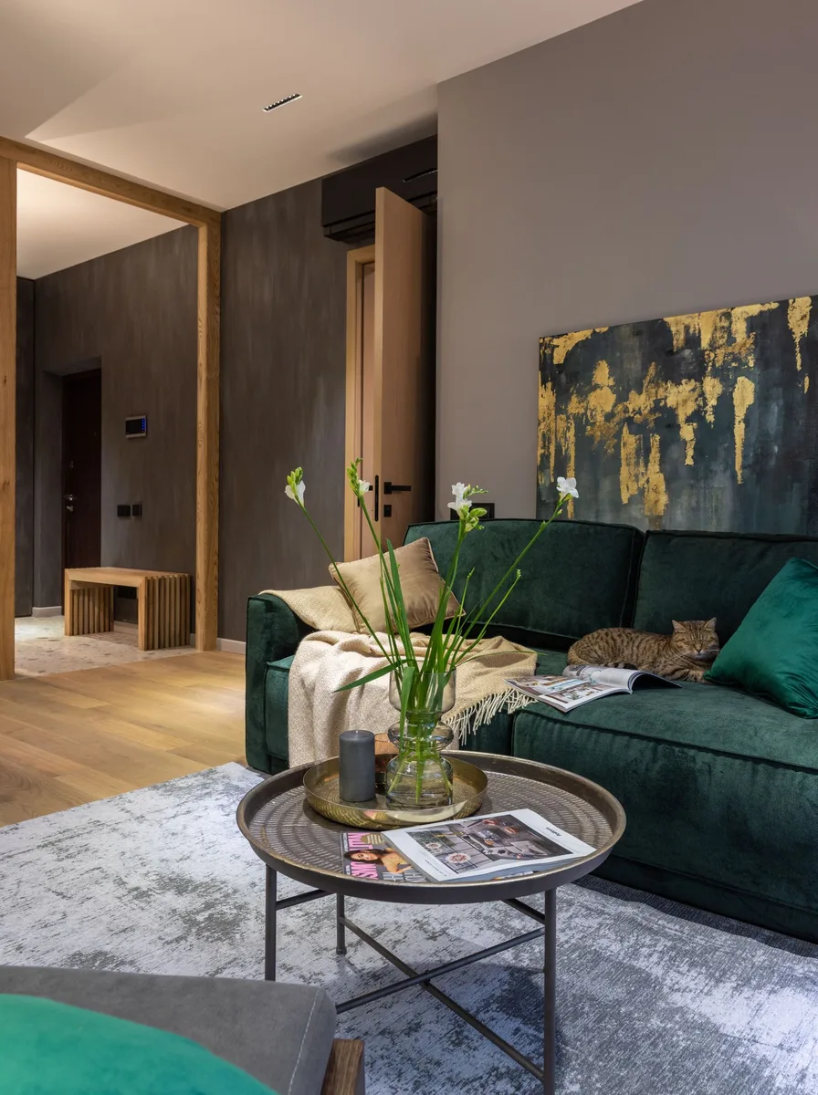 Contemporary reading corner with velvet accent chair