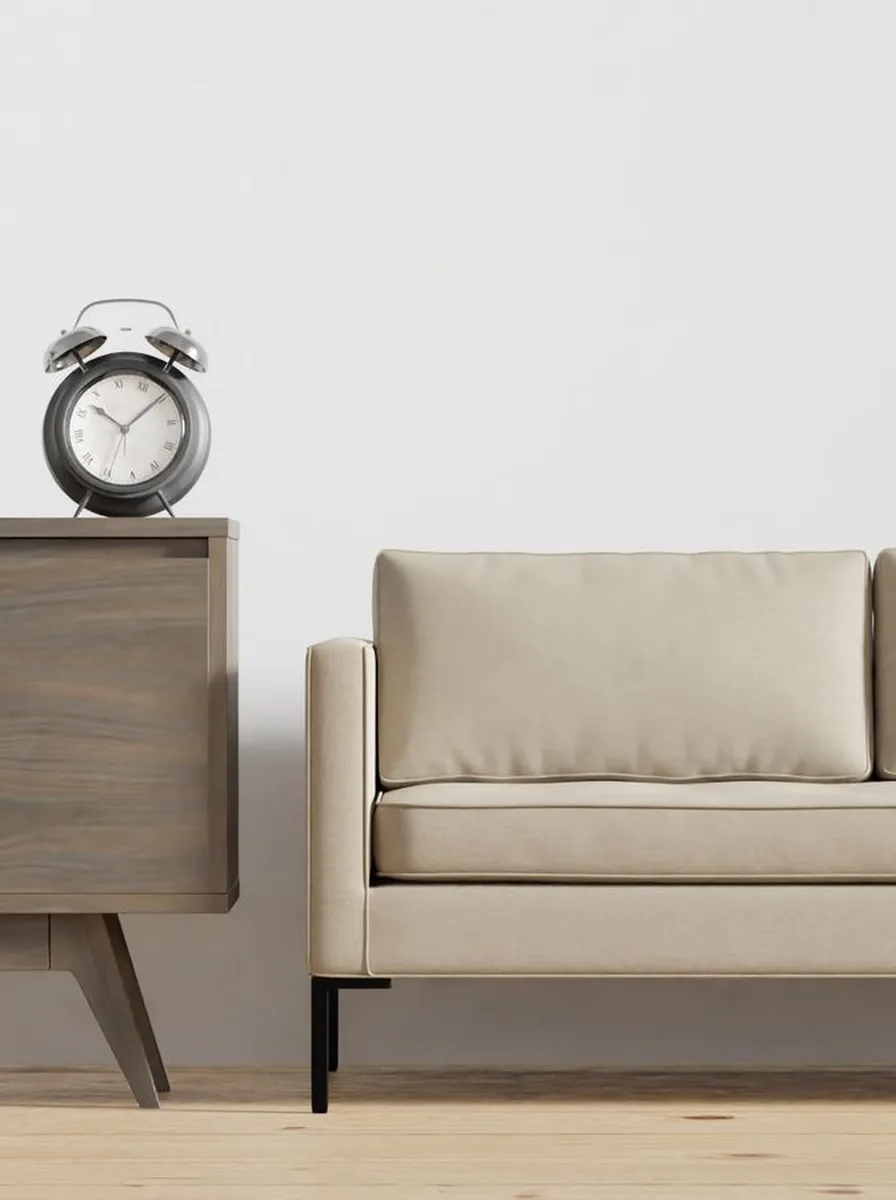 Minimalist elegant living room with a neutral sofa and clean simple lines
