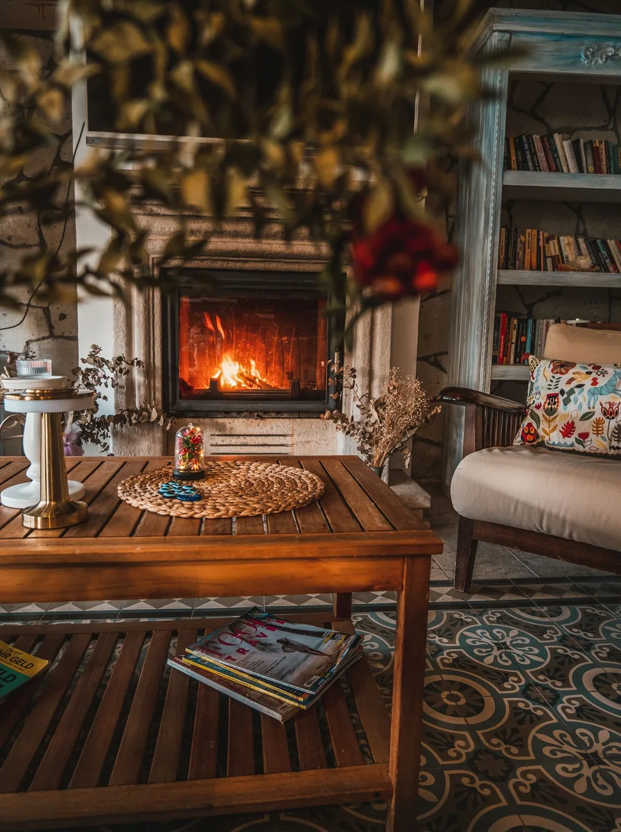 Elegant living room with matching armchairs flanking a fireplace