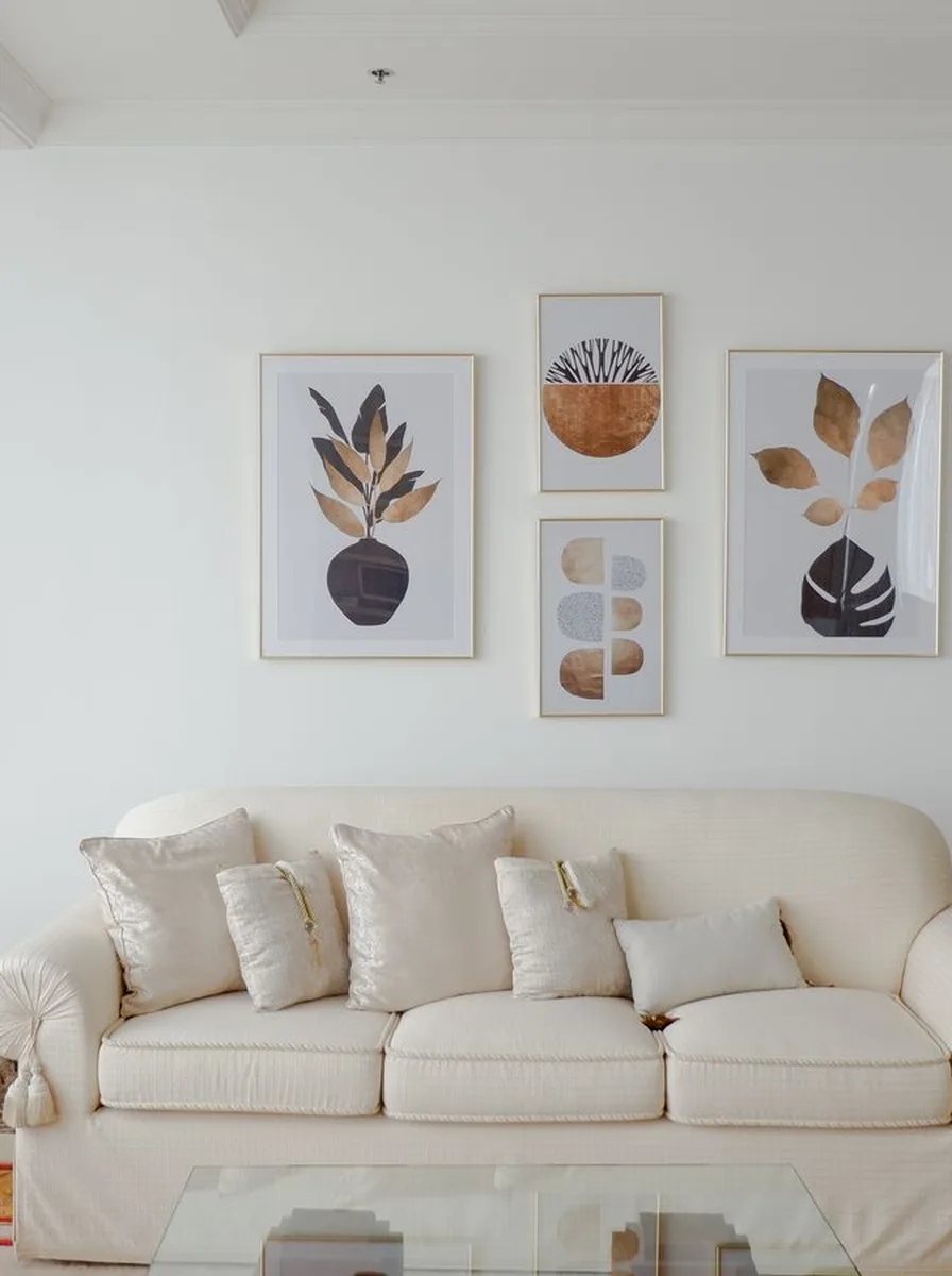 Luxury living room with one oversized statement artwork above the sofa