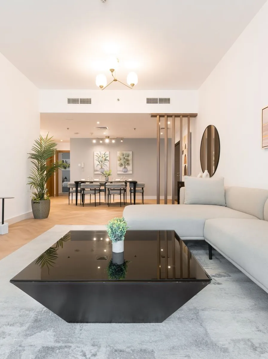 Luxury living room mixing contemporary furniture with timeless classic pieces