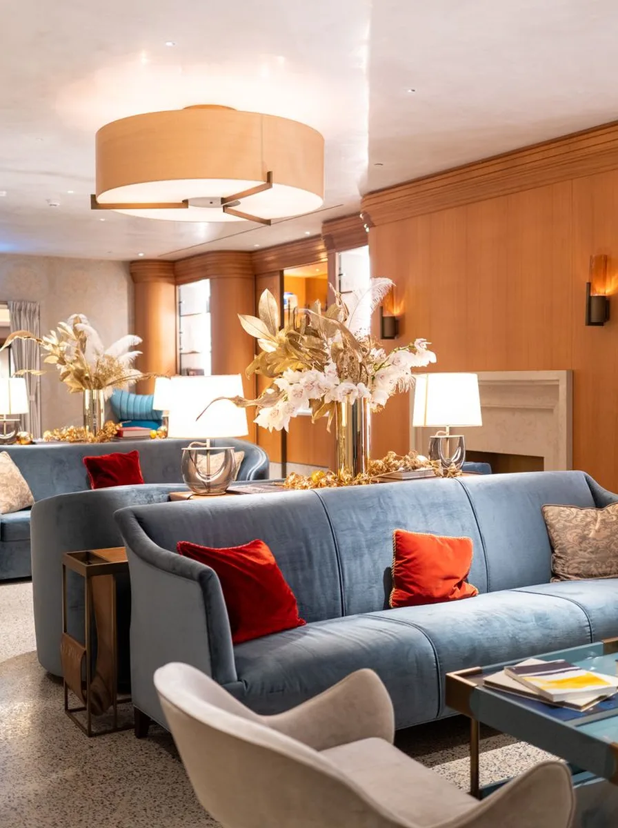 Luxury living room styled like an elegant hotel suite sitting area