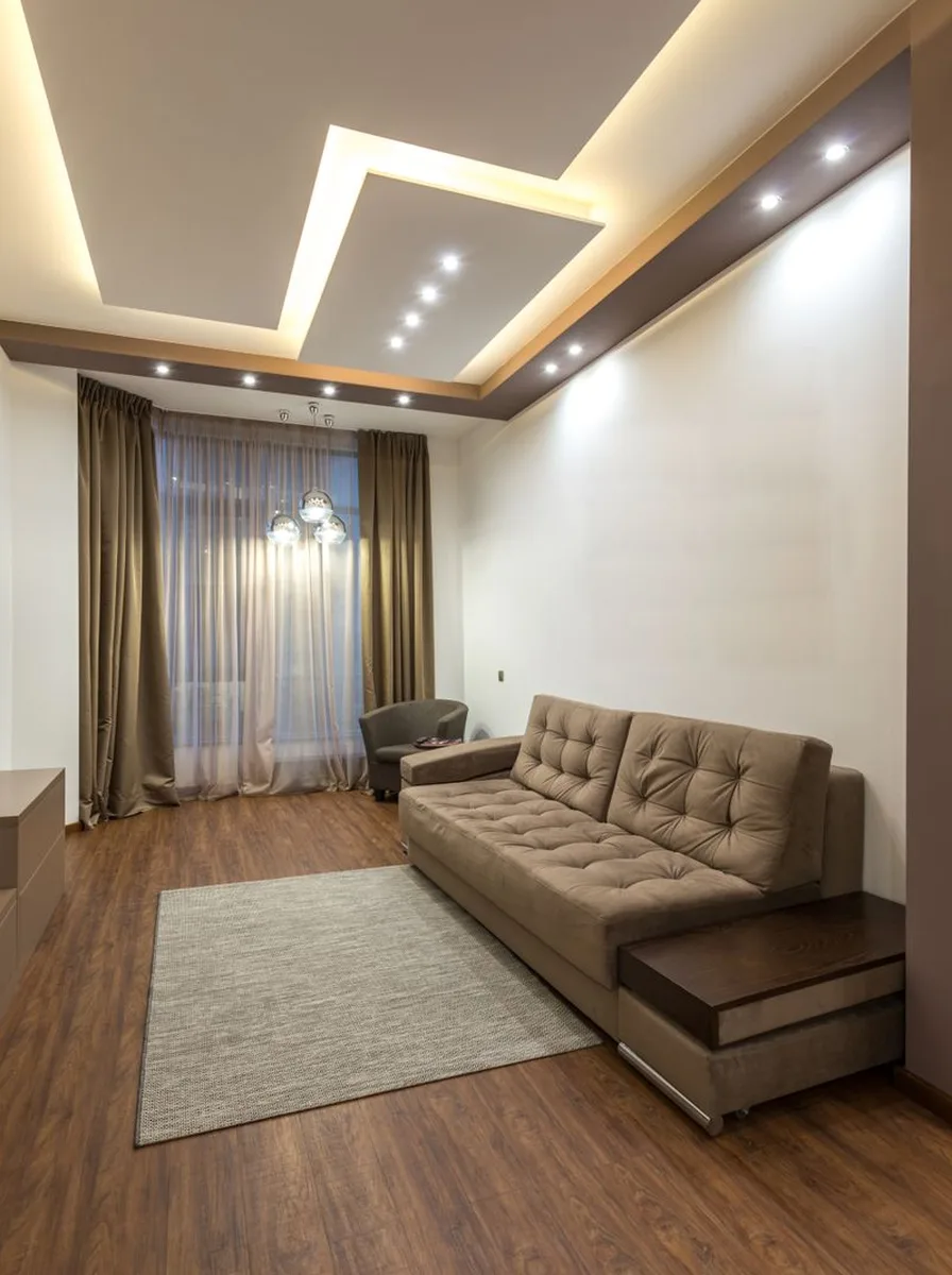 Minimalist living room with clear, uncluttered surfaces