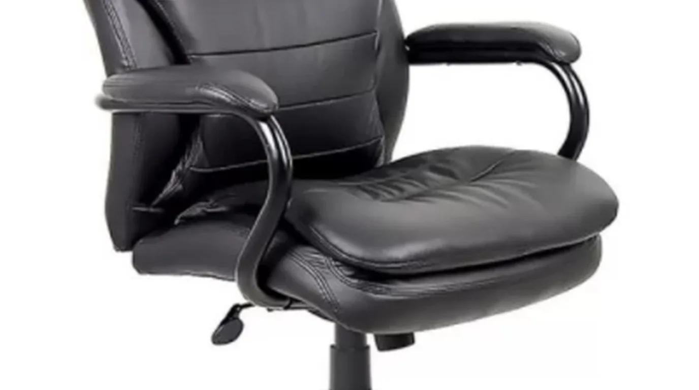 Luxury executive desk chair in a wood-paneled office
