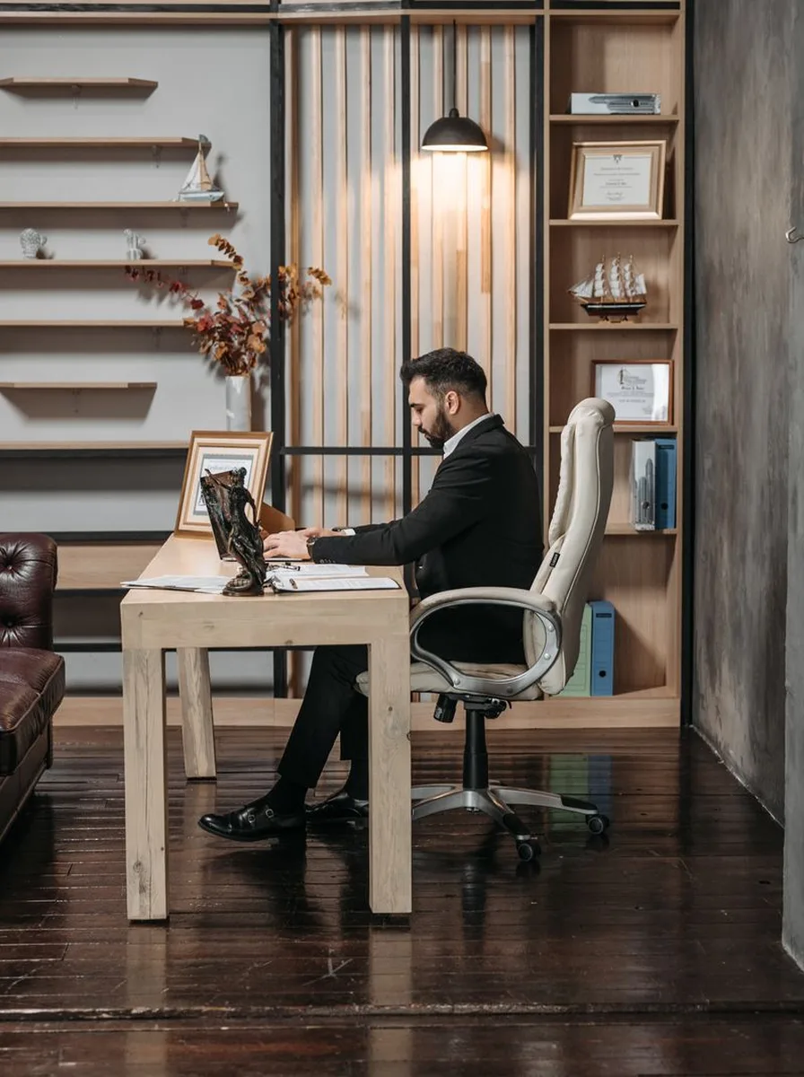 Tufted leather office chair in a refined office
