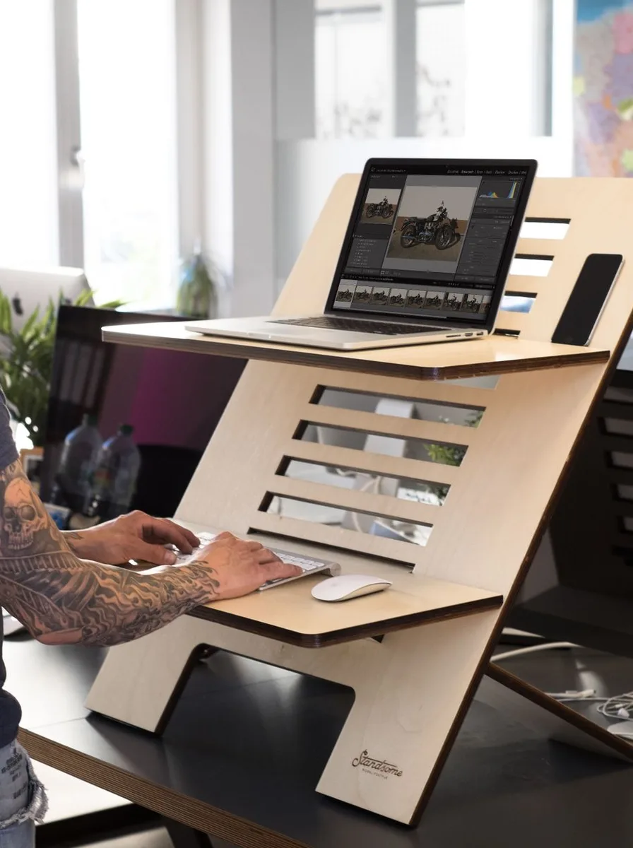 Compact stool for a standing desk setup