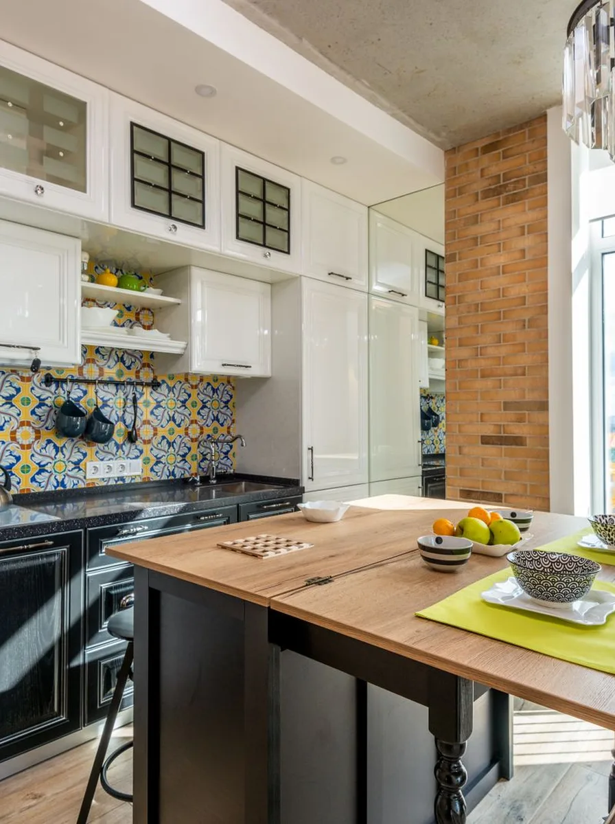 Add Brass Window Hardware for Warmth — modern luxury kitchen with large windows