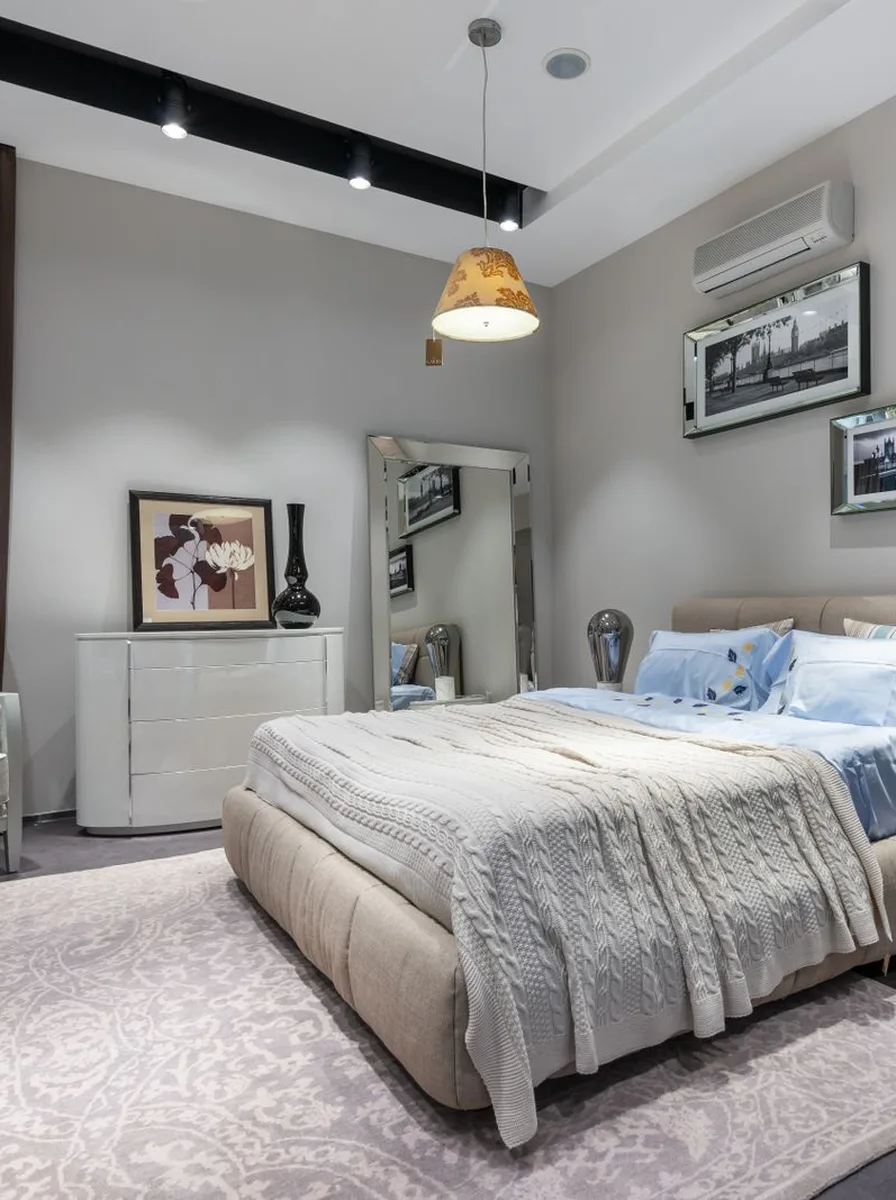 Grey bedroom with gallery wall