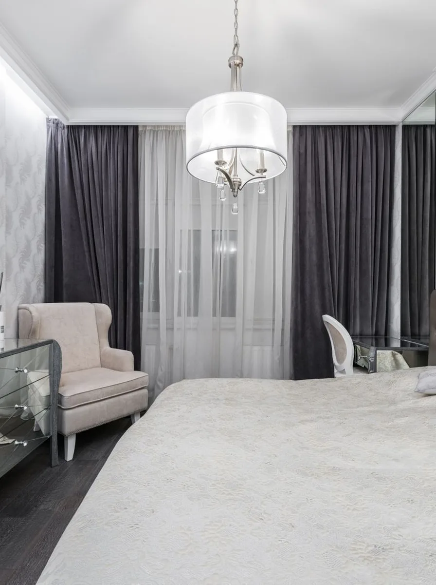 Grey bedroom with pendant light