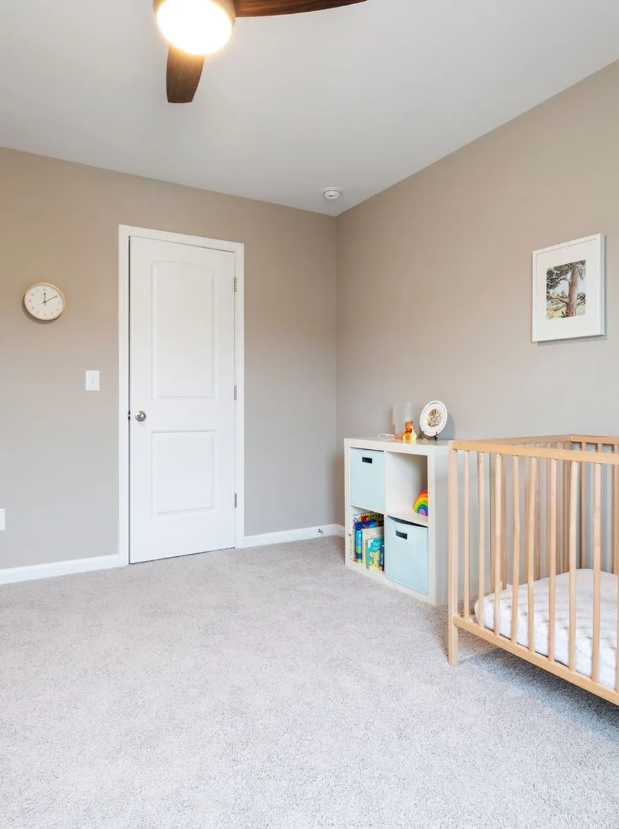 Calm blue nursery with soft lighting designed for peaceful sleep