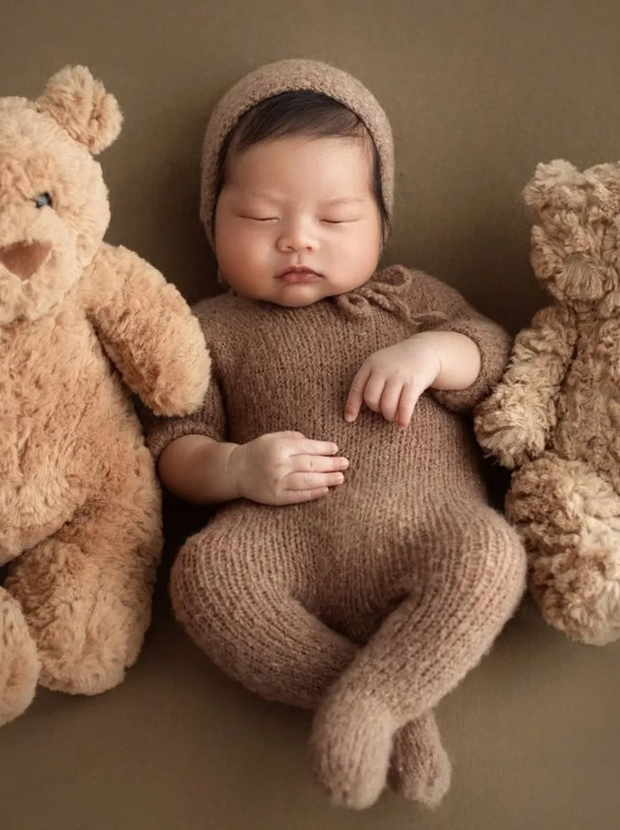Newborn baby with teddy bears