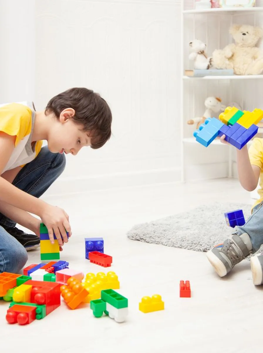 Children playing with building blocks