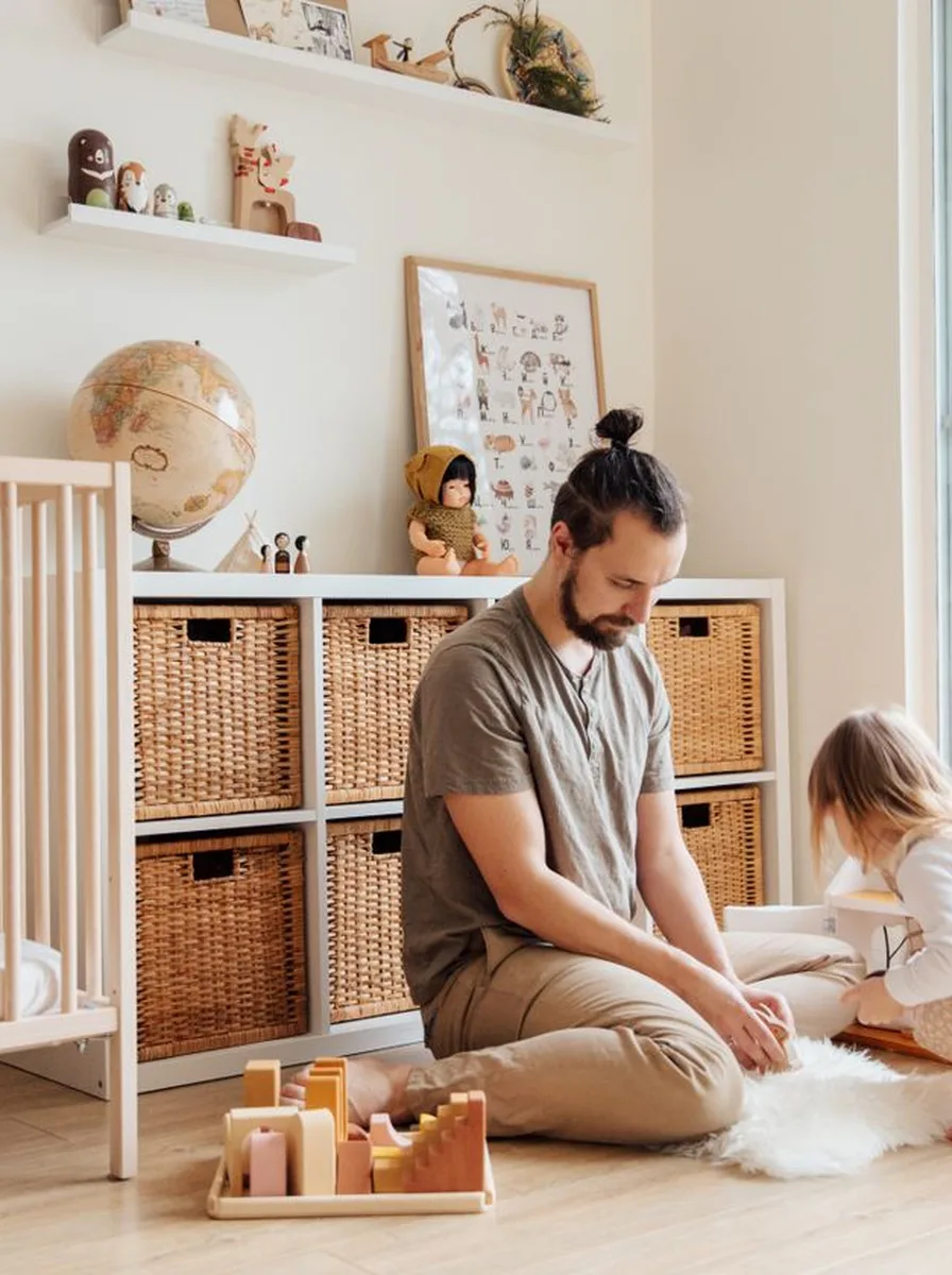 Father and child playing with toys