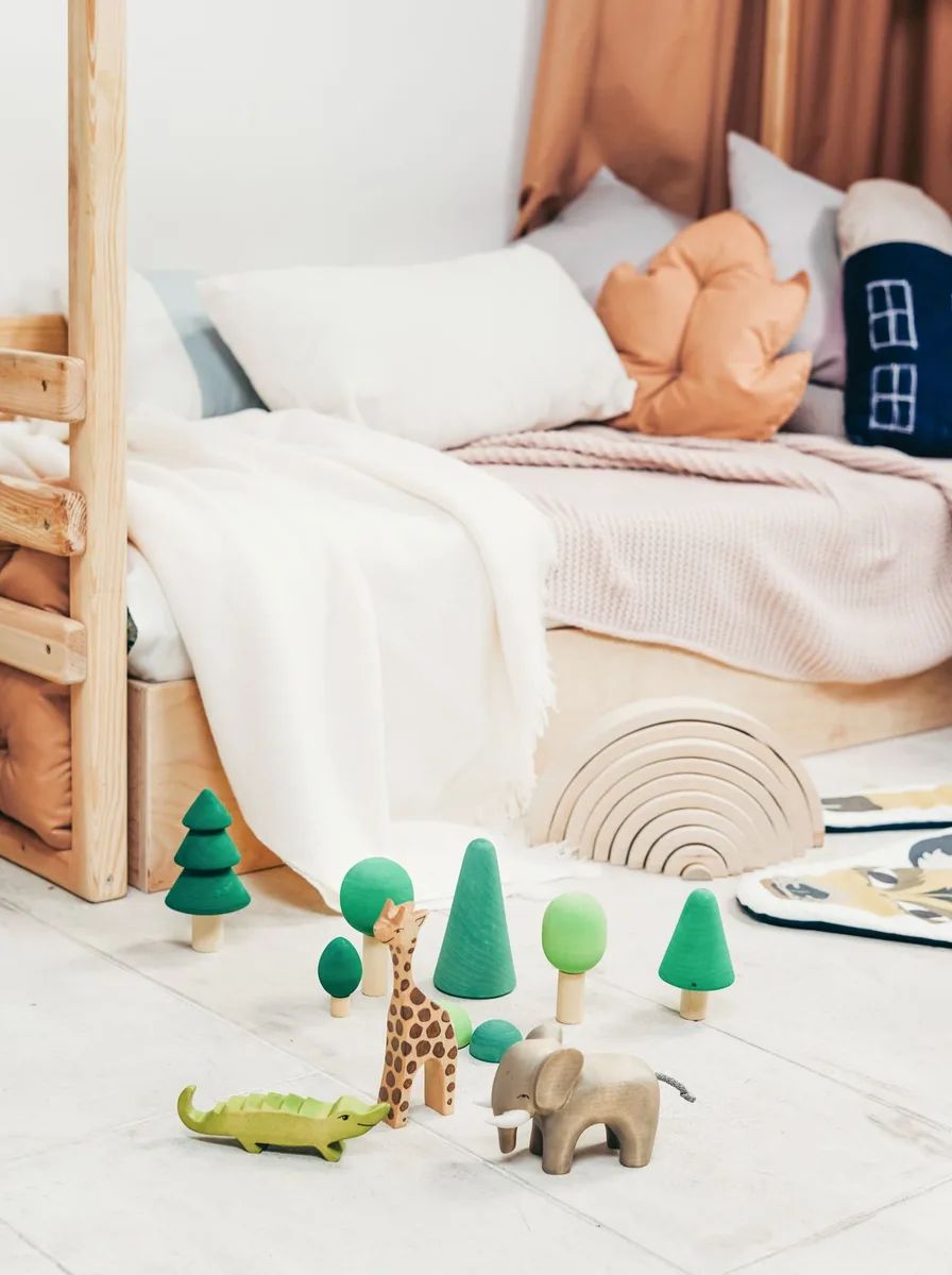 Wooden rainbow stacking toy with animals
