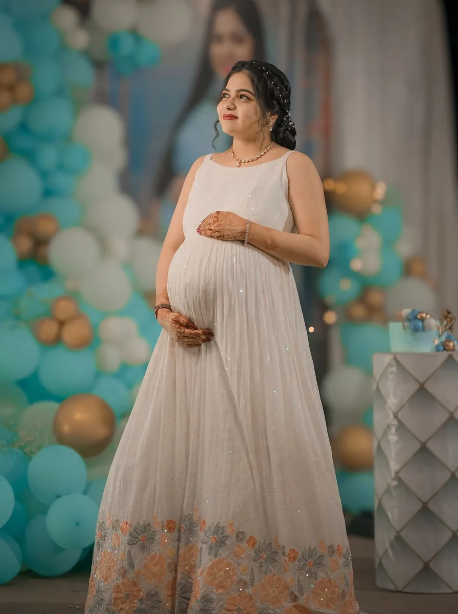 Pregnant woman in a flowing linen dress