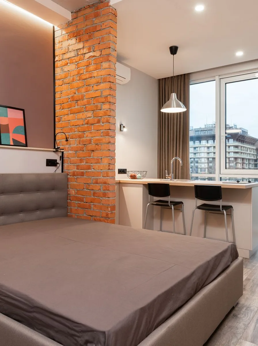 Drop-leaf table extended for dining in small apartment
