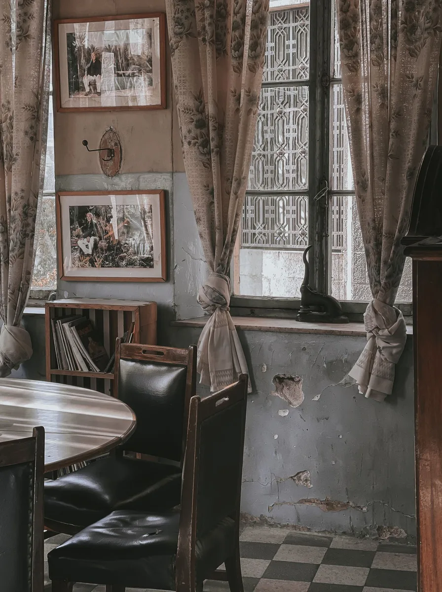 Rustic bistro dining room with a vintage photograph gallery wall