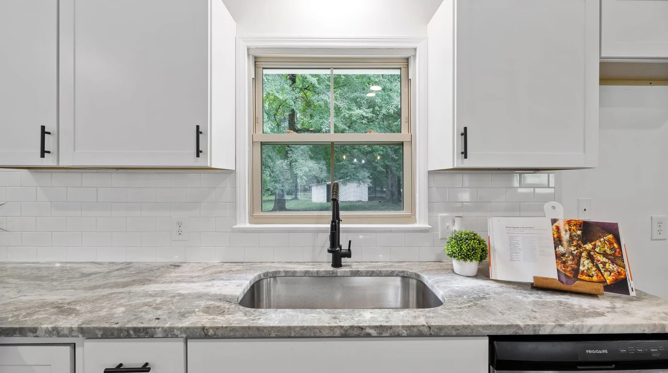 Bright small kitchen window making the kitchen feel bigger