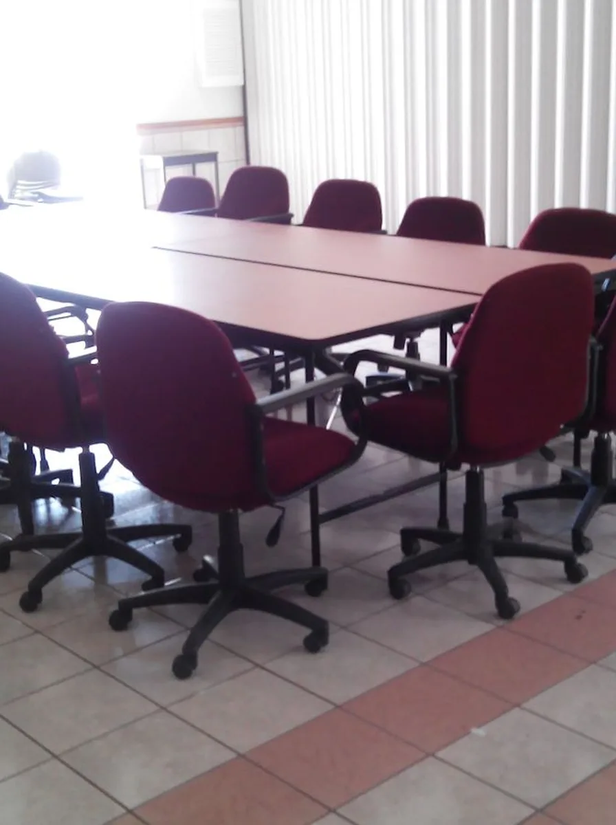 Office chair beside a desk with a laptop