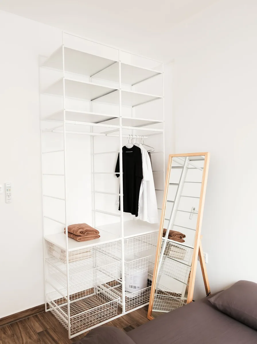 Floating shelves mounted high on bedroom wall