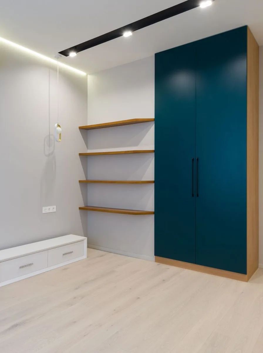 Jewelry organized on wall-mounted hooks panel